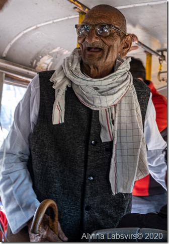 Old man in India on bus